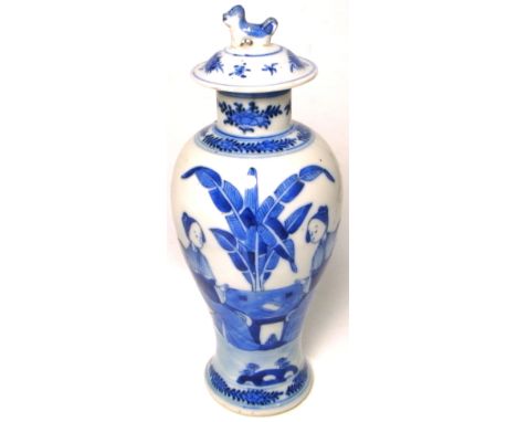 An early 20th century Chinese vase of baluster form with cover depicting ladies seated at a table, height 22cm. CONDITION REP