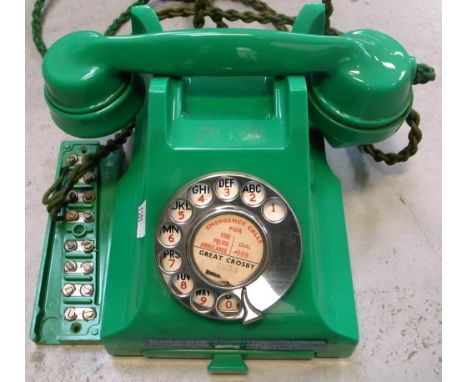 A vintage jade green telephone with original cord flex, serial no.332L S54/2A. CONDITION REPORT Some wear commensurate with a
