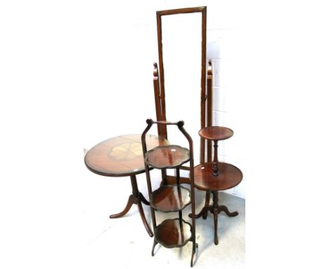 A reproduction mahogany and inlaid occasional table on tripod support, two mahogany stands and a cheval mirror with fluted su