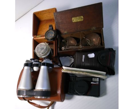 An F. Barker & Son military compass, a Thomas Cheshire & Co Liverpool cased pair of scales, Nikon L35af camera, a ships compa