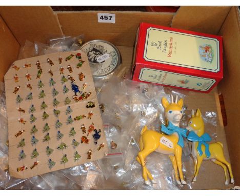 Two Babycham Bambi figures and a large quantity of enamel police charity Rupert the Bear and Friends lapel badges