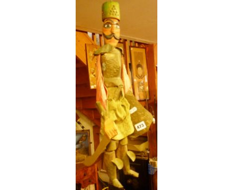Vintage French painted wooden soldier puppet, holding a sword and shield