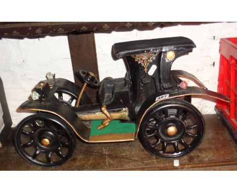 Vintage metal car model made from an antique Singer sewing machine