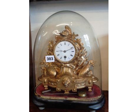 French ormolu mantle clock under glass dome