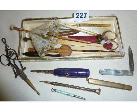 Interesting lot of 19th c. sewing implements - lace bobbins, chatelaine scissors, crochet hooks, also including a gold? prope