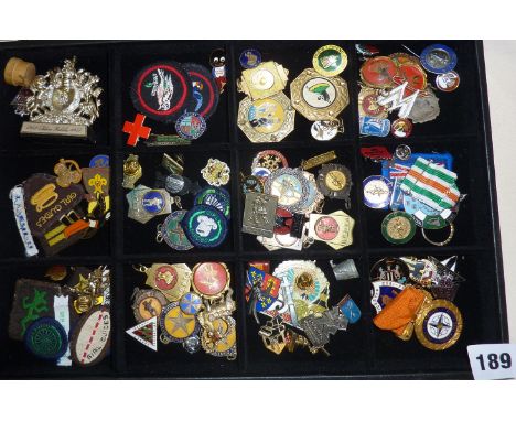 Display case containing old enamel &amp; cloth badges, medals ect, including Girl Guides, Football, Advertising etc