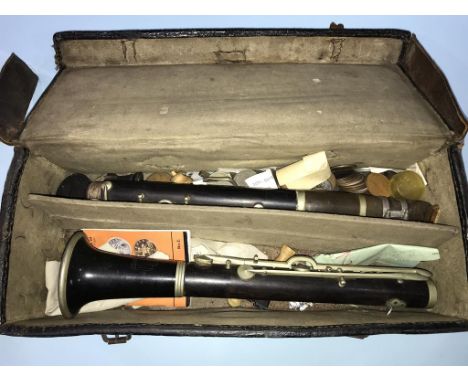 A clarinet, stamped Predominant, in fitted case