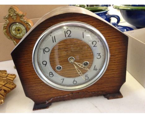A wooden 8 day mantle clock by Bentima.
