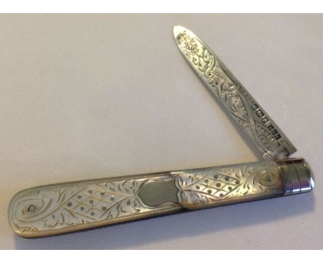 Hallmarked silver and mother of pearl fruit knife, nicely engraved with blank cartouche. Length approx 8cm. HM Sheffield 1907