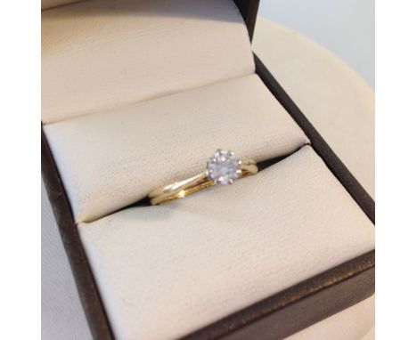 An 18ct gold & diamond solitaire ring. Diamond approx 0.3 carat. Tests as 18ct gold (ring was rebuilt). Size I.