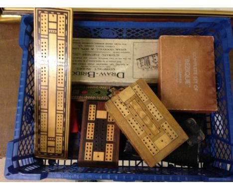 A box of playing card game items to include a vintage miniature set of playing cards, card dominoes, a Bezique set, poker dic