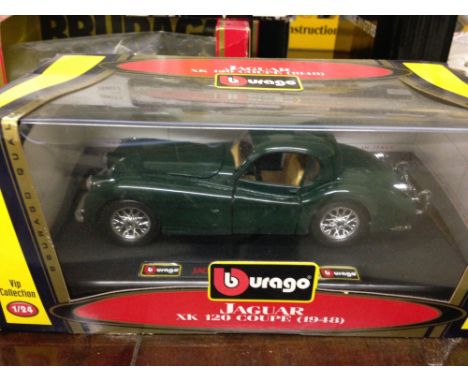 A boxed Bburago 1:24 scale model Jaguar XK120 Coupe (1948).