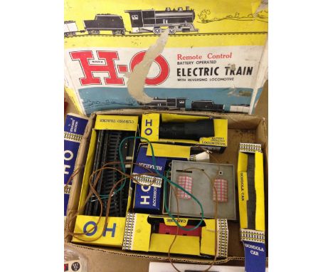 A boxed Marx HO electric train set with locomotive and gondola car.