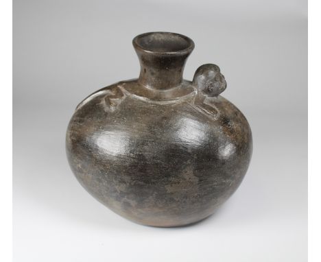 A lovely Chimu-Inca monkey vessel from Peru, ca. 1300 - 1500 AD. Features a nicely detailed monkey with curled tail draped ov