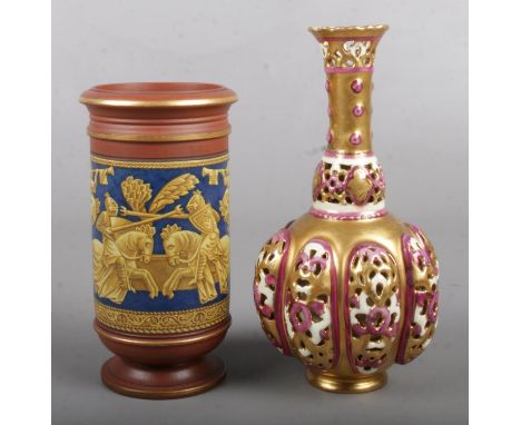 A Zsolnay reticulated vase along with a Victorian spill vase decorated with a battle scene. Zsolnay 14.5cm.  Repair to Zsolna