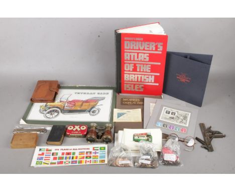 A box of assorted collectables. To include a Penny Black Anniversary Book, vintage spectacles, Oxo cube tin, a pocket Bible d