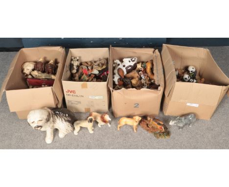 Four boxes of ceramic and composite figures, mainly animals.  