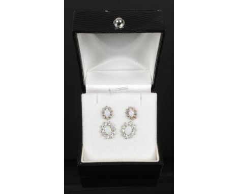 A Pair of 10ct Gold Opal Earrings, together with A Pair of Yellow Metal and Opal Earrings.  