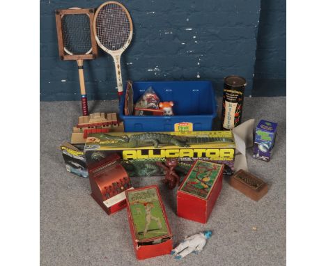 A quantity of toys and games. Including Alligator game, vintage tennis rackets, boxed Oval Cricket, figures, Hornby railway b