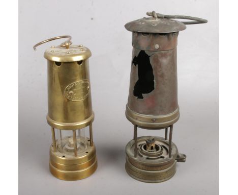 Two miners lamps. Including Lamp &amp; Limelight Company, Hockley example, etc.  Largest example has a large hole.