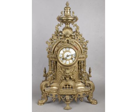 A Large Decorative Brass French Mantle Clock. Chimes on the Half Hour and on the Hour.  Overall good condition.