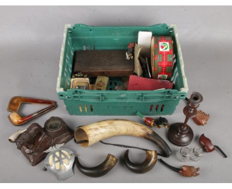 A box of collectables. Including Black Forest Bear inkwell, tinplate bird &amp; penguin, horns, badges, pipes, silver top jar