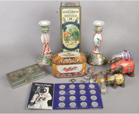 A quantity of mostly collectables. Including vintage tins, composite Indian elephants, wristwatches, Man in Flight coin set, 