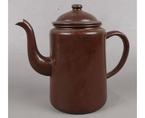 A WWII metal military teapot, baring the broad arrow mark.  