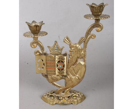 A Brass Religious Candlestick with Hinged Opening revealing the Star of David at the Top of Each Side.Stamped 'Israel' on the