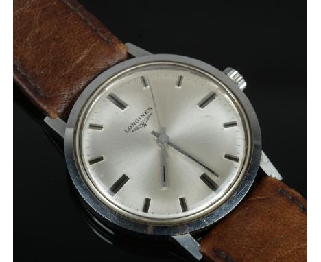 A Longines stainless steel manual wristwatch. 3.5cm diameter without crown.  Running.