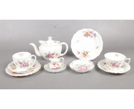 A part Crown Derby tea set. To include small teapot, two cups &amp; saucers, plate and trinket dish etc.  