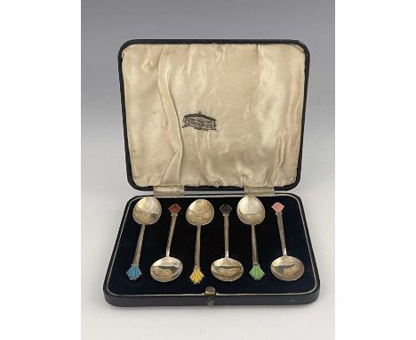 A harlequin set of six Art Deco silver and enamelled tea spoons, William Hair Haseler, Birmingham 1933, each with a fan shape