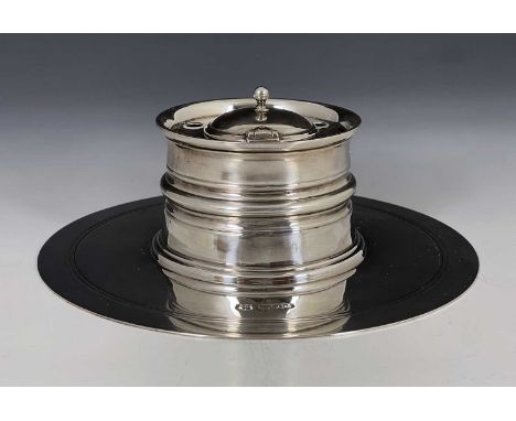 A Victorian silver 17th century style inkwell, Goldsmiths and Silversmiths Company, London 1898, the flat disc base with ribb