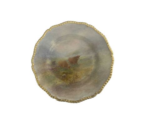 Harry Stinton for Royal Worcester, a Highland Cattle painted plate, gilt gadrooned border, decorated with a misty landscape w
