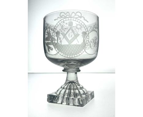 A George III masonic engraved rummer, circa 1810, the rounded bowl engraved with three roundels of masonic emblems and monogr