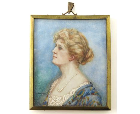 J Crawford (British early 20th century), portrait miniature of an Edwardian woman, wearing a string of pearls, blue shawl, si