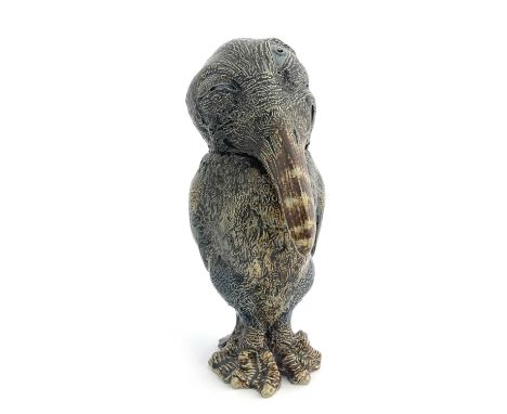 Robert Wallace Martin for Martin Brothers, a stoneware sculptural bird jar, 1881, modelled as a characterful figure with lops