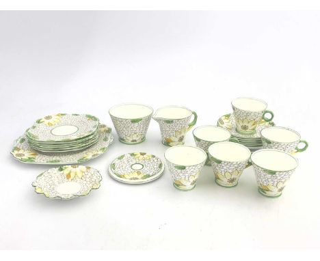 An Art Deco tea set, T C Poole and Galdstone china, circa 1930s, conical form with green and range transfer floral design, in