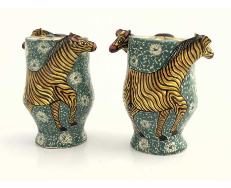 Ojavia and Sindy for Ardmore Pottery, a pair of studio pottery salt and pepper pots, 2002, each modelled with two giraffes, t