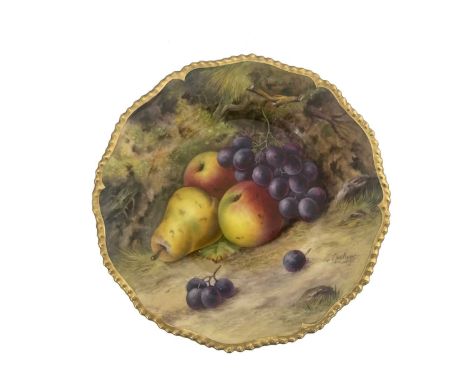 T Lockyer for Royal Worcester, a fruit painted plate, decorated with pears and grapes, within a gilt gadrooned border, black 
