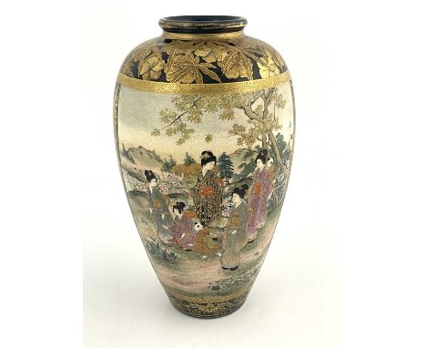 A Japanese satsuma ware baluster vase, Meiji period, 1868-1912, painted with a panel of fashionable ladies and infants and a 