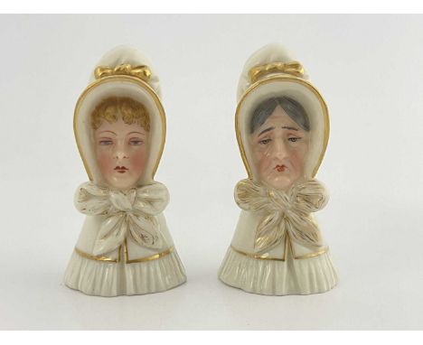 Two Royal Worcester candles snuffers, the Old Woman and Young Woman, highlighted in gilt, green marks, 8.5cm high (2)