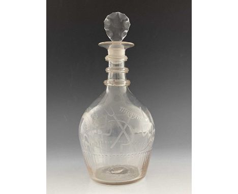 An Irish glass three ring neck Harvest decanter, circa 1800, probably Cork, Prussian form, engraved with harvest tools, ploug