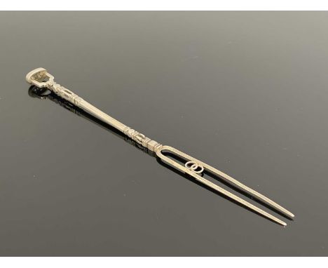 A 17th century silver sweetmeat fork, possibly Italian, unmarked, twin pronged, on a cut and pierced gallery handle with reti