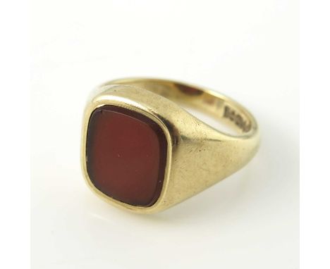 A 9 carat gold and carnelian set signet ring, size R 1/2, 6.6g