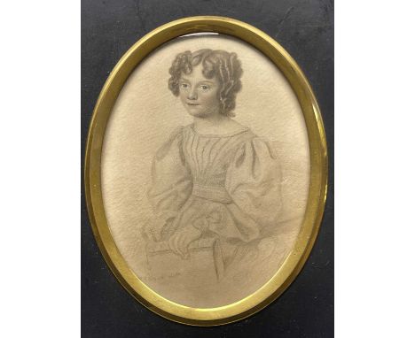 British School, circa 1830, oval portrait miniature of a young lady, half-length seated holding a book, indistinctly signed l