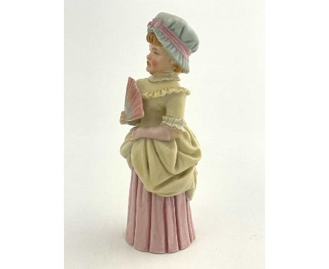 A Royal Worcester Town Girl candle snuffer, modelled as a Kate Greenaway character, pink and yellow with gilt highlights, gre