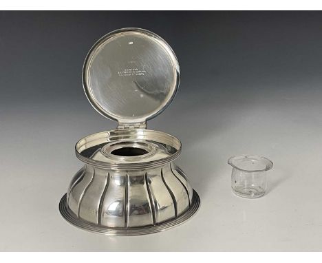 A Victorian silver inkwell, John Grinsell and Son, Birmingham 1890, fluted ogee domed with flat hinged lid and fluted foot, g