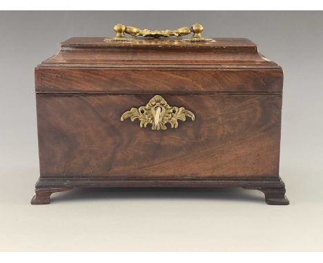 A George II mahogany tea caddy, circa 1740, cast brass Rococo swing handle, caddy top, triple division interior, scroll escut
