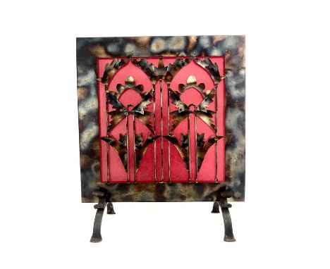 In the style of Christopher Dresser, a modernist metal firescreen, circa 1996, stylised geometric foliate design, signed with